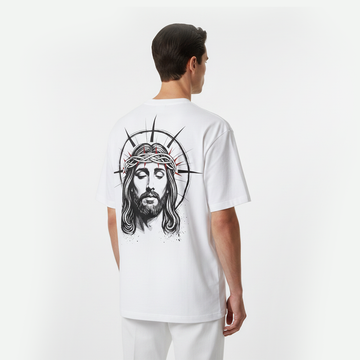 Person wearing a white t-shirt with a graphic design on the back, standing against a plain background.