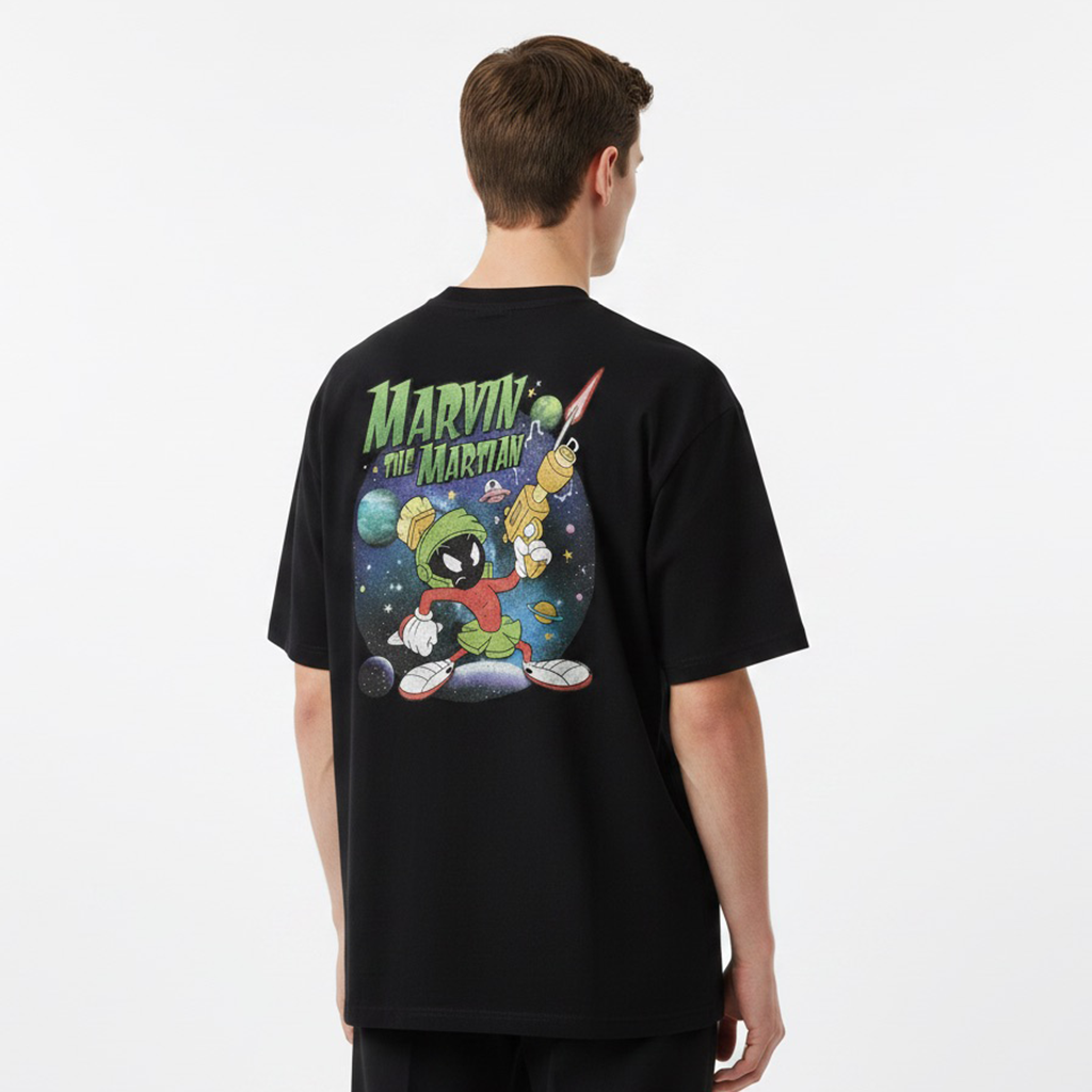 Person wearing a white t-shirt with Marvin the Martian graphic on the back