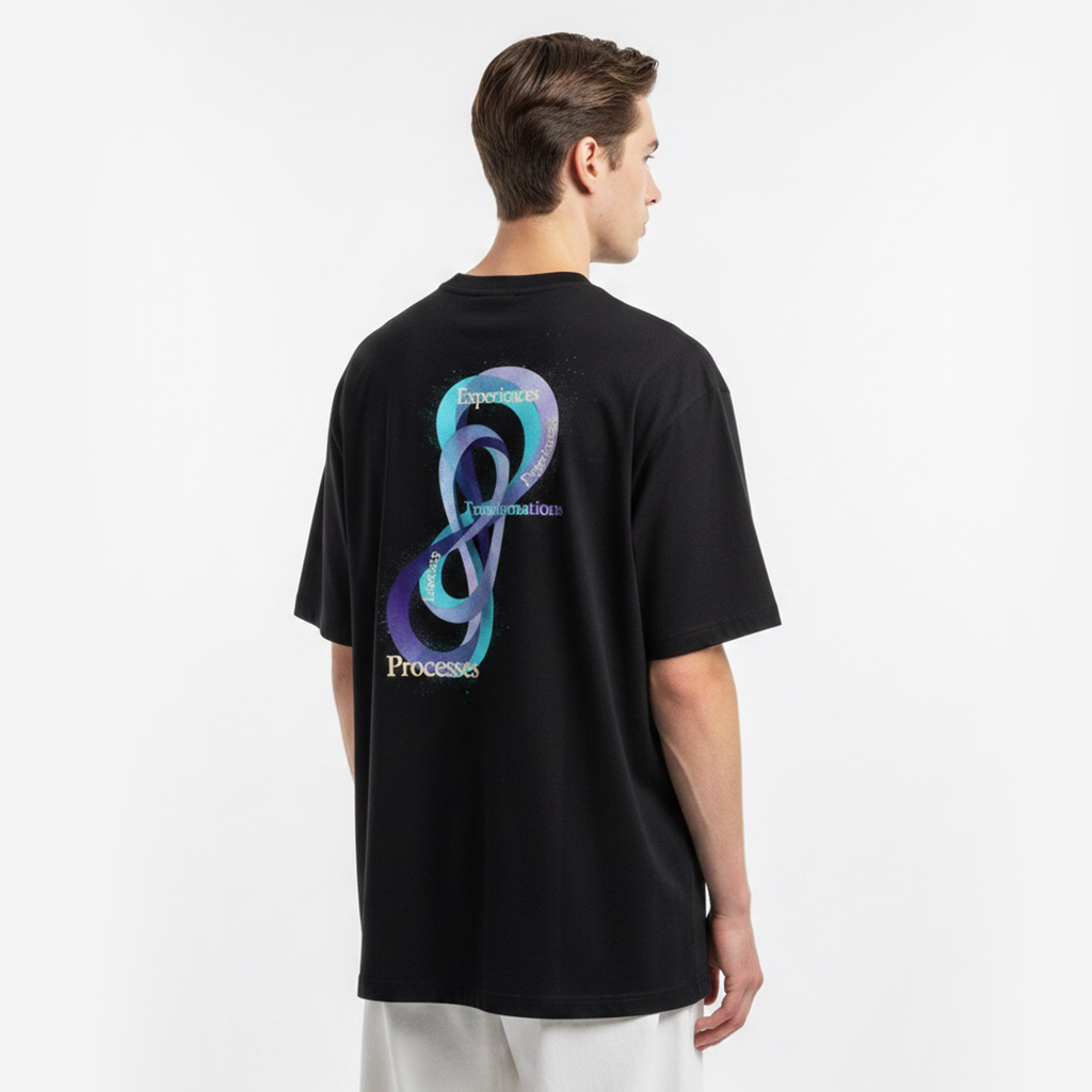 Person wearing a white t-shirt with a colorful design on the back against a white background