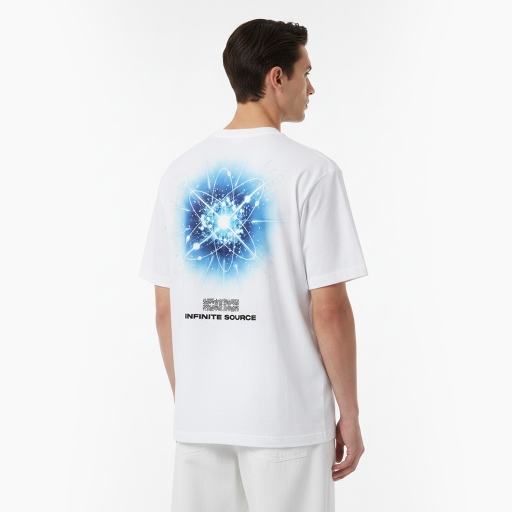 Person wearing a white t-shirt with a blue graphic on the back against a white background