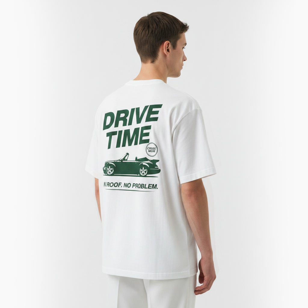 Person wearing a white t-shirt with 'Drive Time' graphic on the back, standing against a plain background.