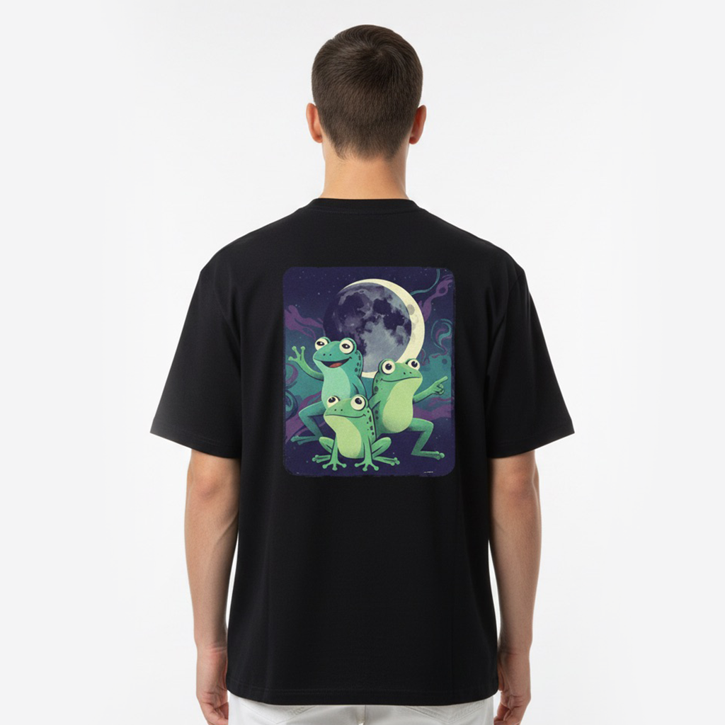 Person wearing a white t-shirt with a colorful graphic of two frogs on the back.