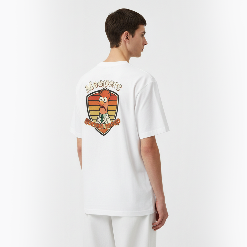 Person wearing a white t-shirt with a graphic design on the back against a white background