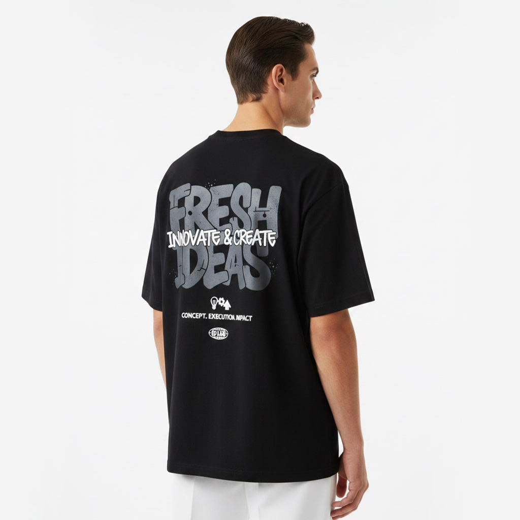 Person wearing a white t-shirt with text on the back against a white background