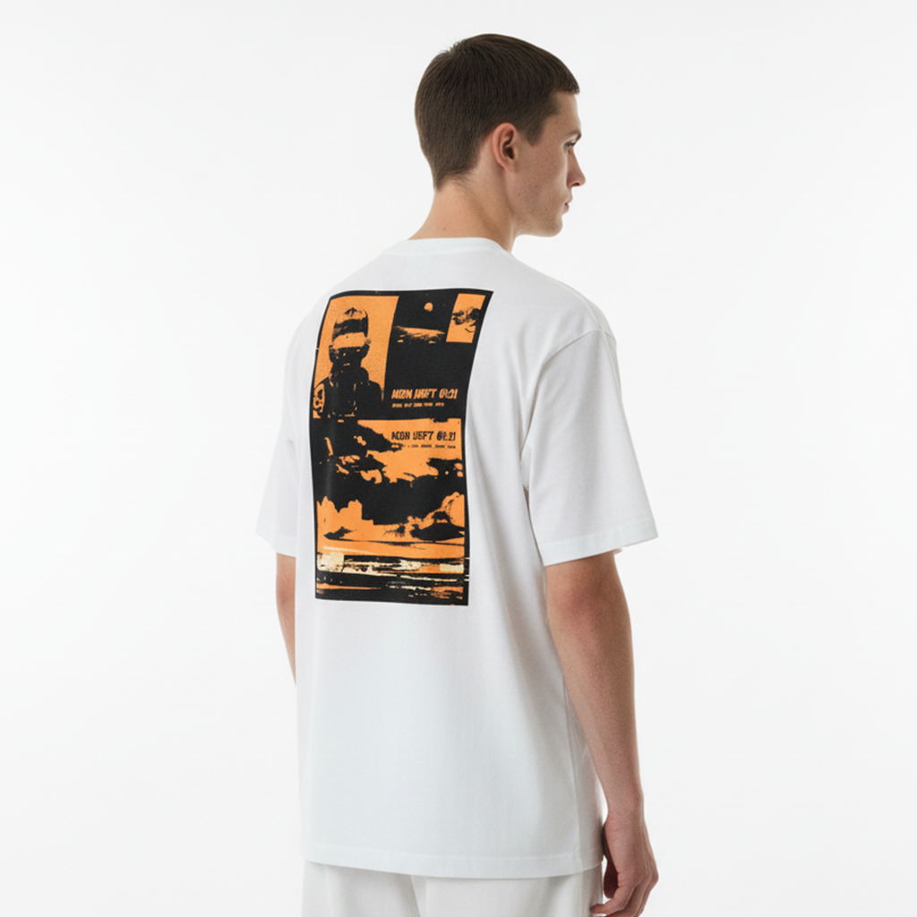 Person wearing a white t-shirt with an orange and black graphic on the back against a white background