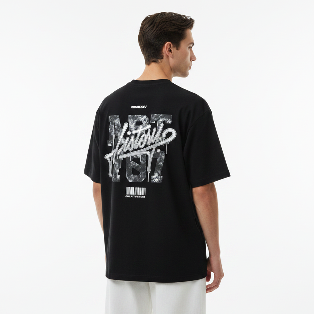 Person wearing a white t-shirt with black graphic design on the back against a white background