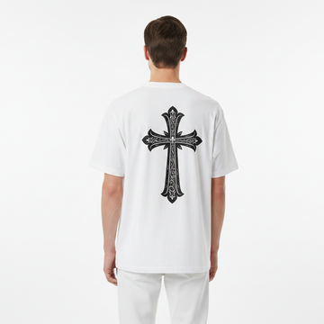 Person wearing a white t-shirt with a black decorative cross on the back against a white background