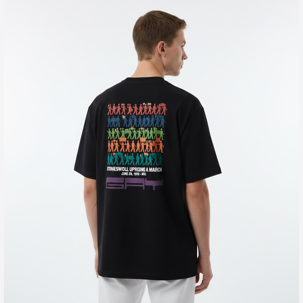 Person wearing a white t-shirt with colorful graphic on the back against a white background