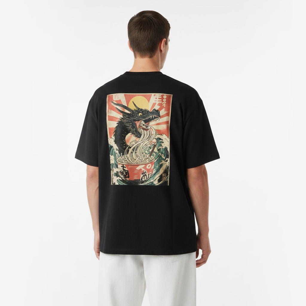Person wearing a white t-shirt with a dragon design on the back against a plain background