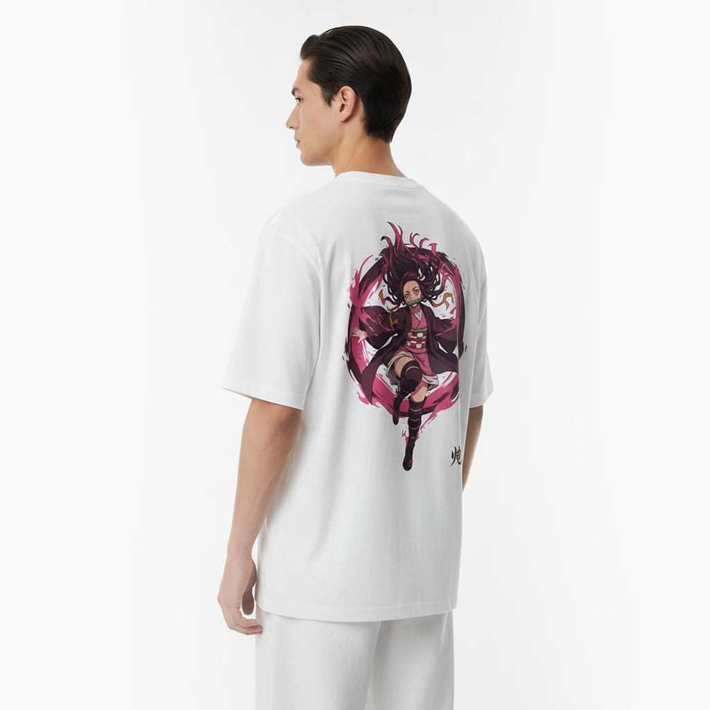 Person wearing a white t-shirt with a colorful graphic design on the back, standing against a plain background.