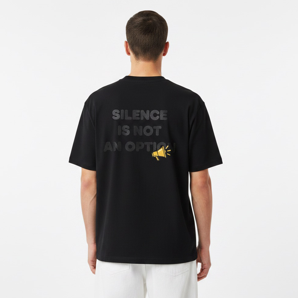 Person wearing a white t-shirt with 'Silence is not an option' text on the back.