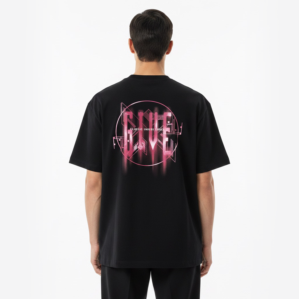 Person wearing a white t-shirt with pink graphic design on the back against a white background