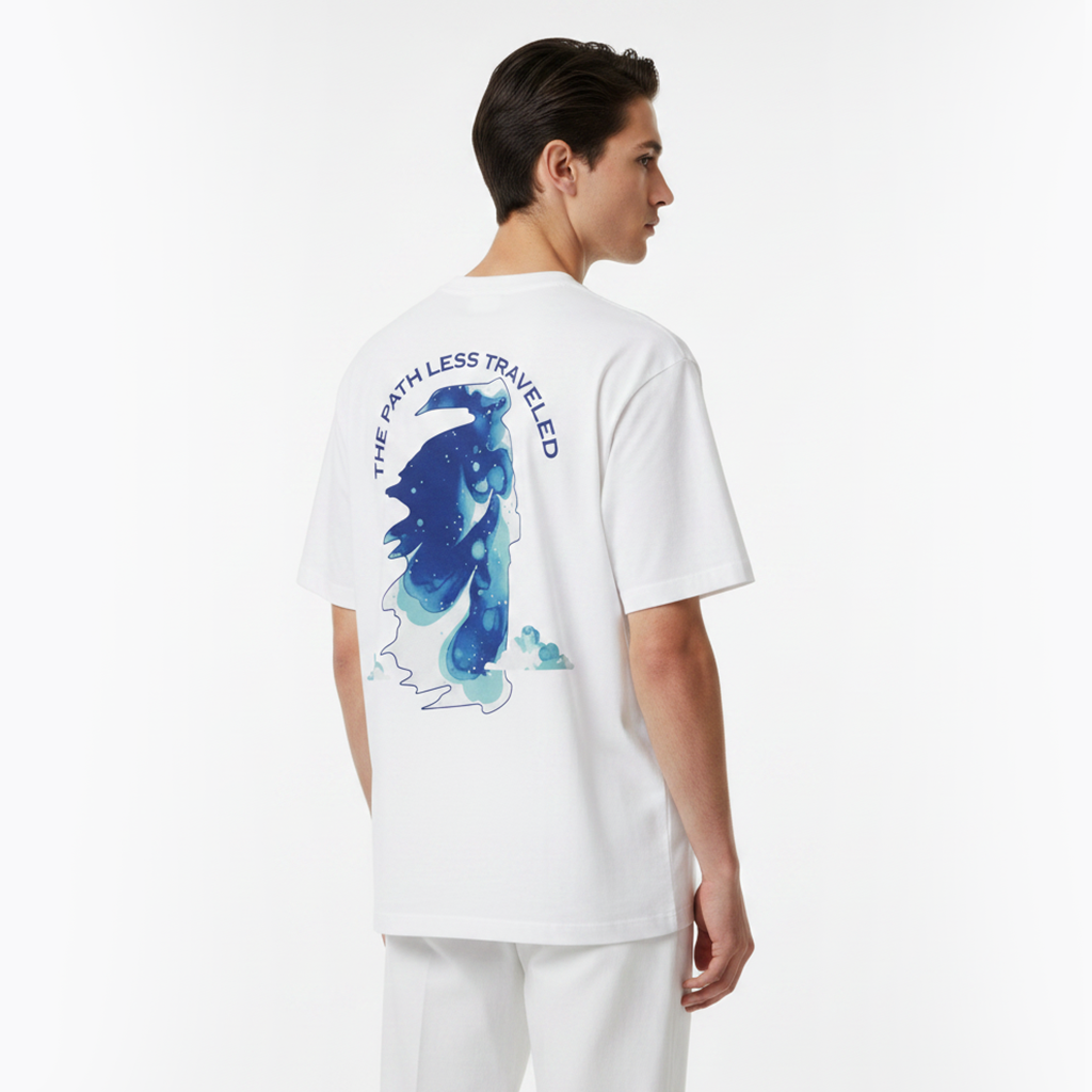Person wearing a white t-shirt with a blue graphic and text on the back, standing against a white background.
