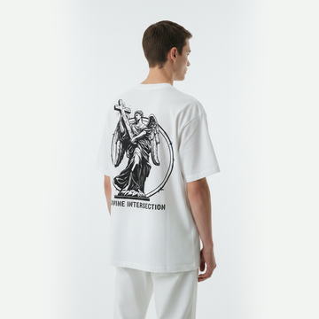 Person wearing a white t-shirt with a black graphic design on the back against a white background
