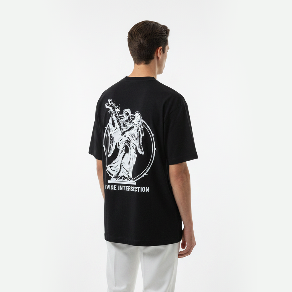 Person wearing a white t-shirt with a black graphic design on the back against a white background